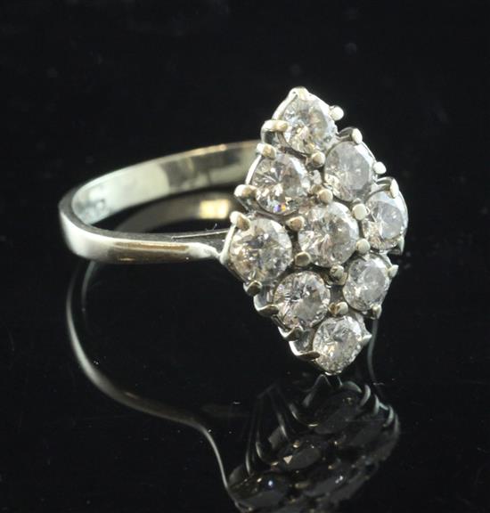 A Victorian style 18ct gold and diamond marquise shaped cluster ring, size N.